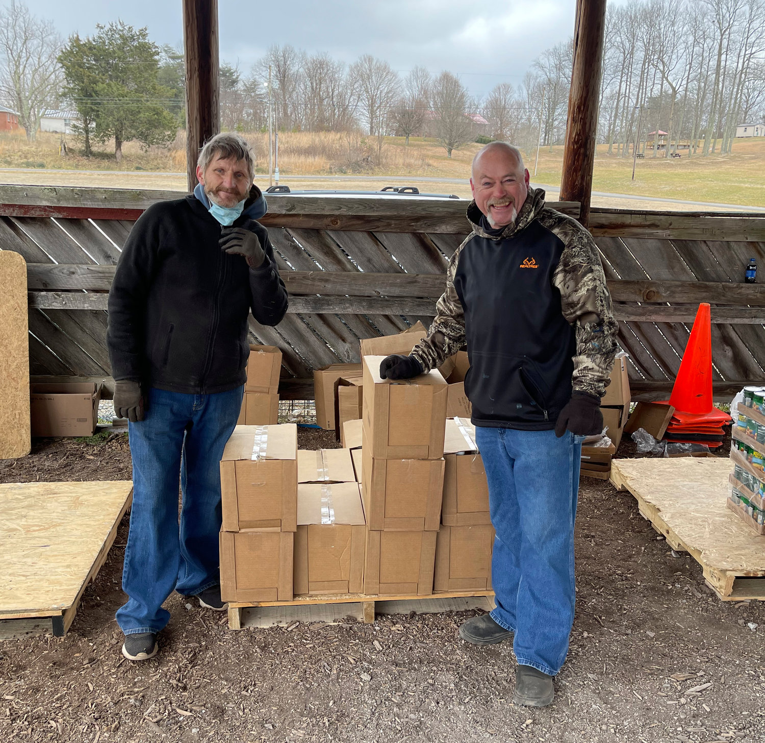 Pictured, from left: Danny McKeehan and William Moody. Moody has completed his hours and now enjoys coming out to help at UCHRA commodities distribution events.